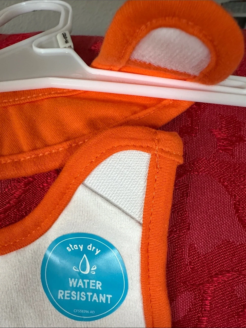 Carter's White Bib with Orange Trim 